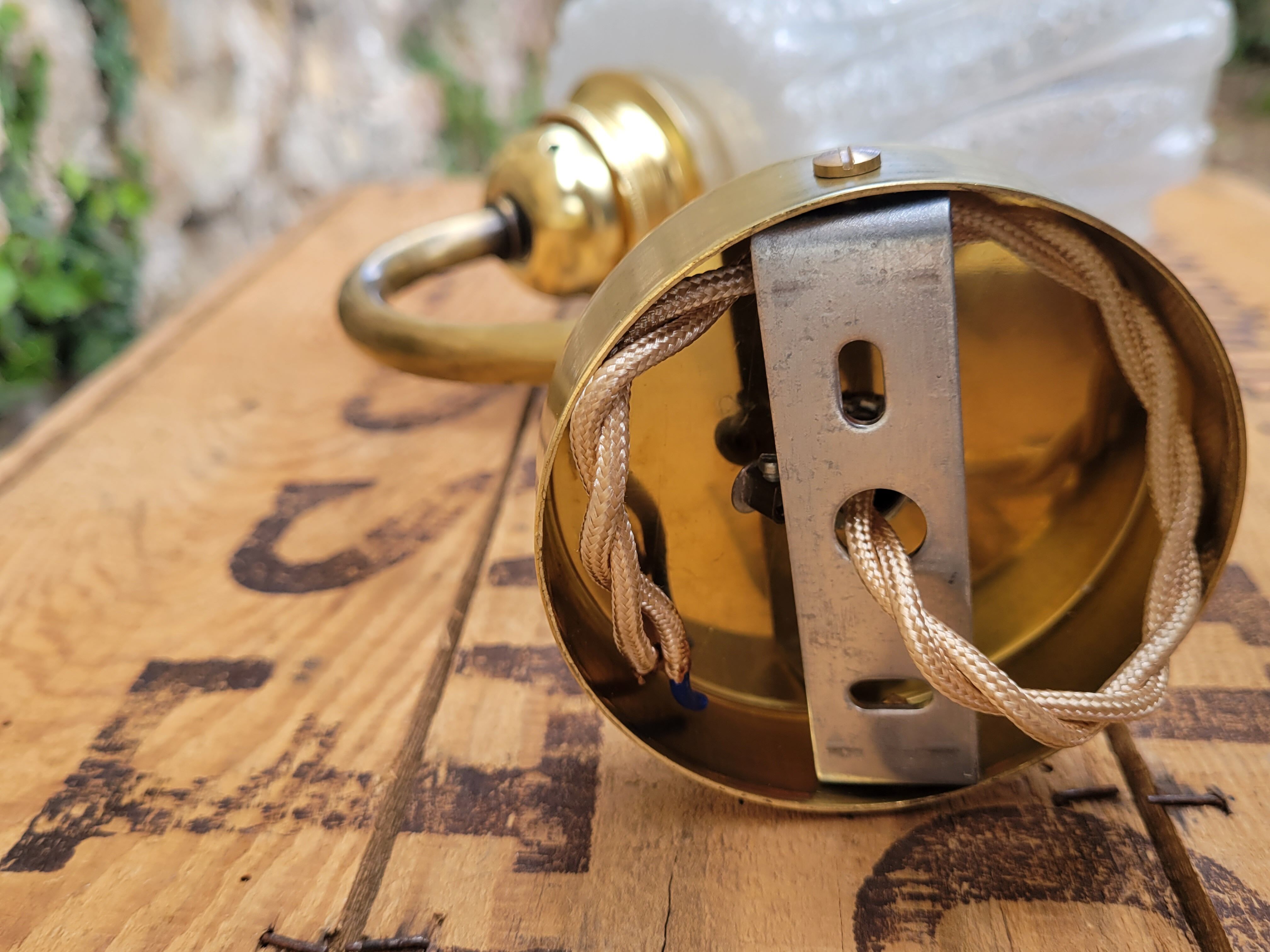 Brass and moulded glass sconce