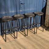 Tabourets en cuir noir
