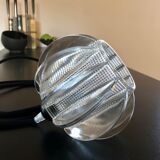 A portable lamp like a Holophane