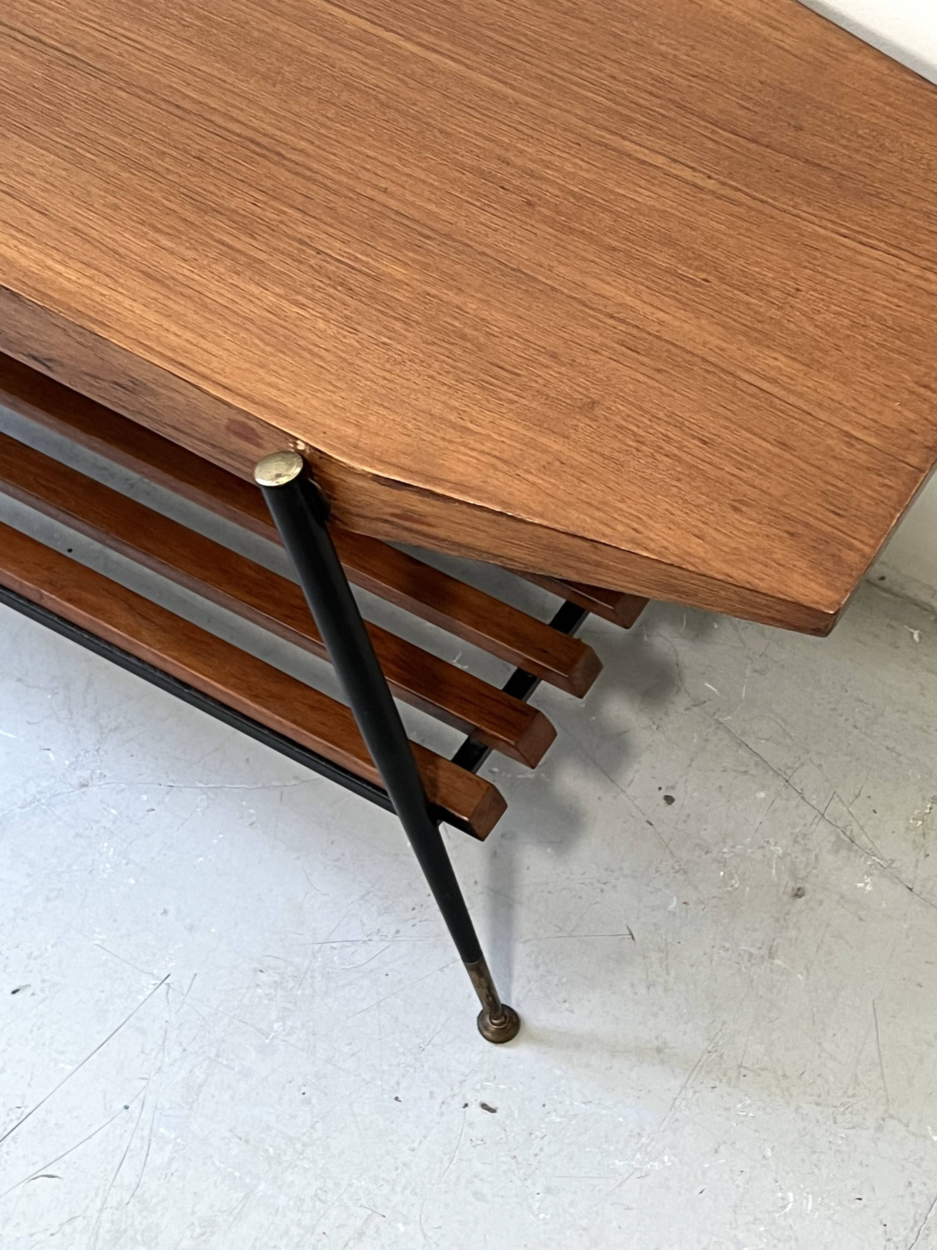 Mid-century coffee table with 2 mahogany wood tops and brass detail, Italy.