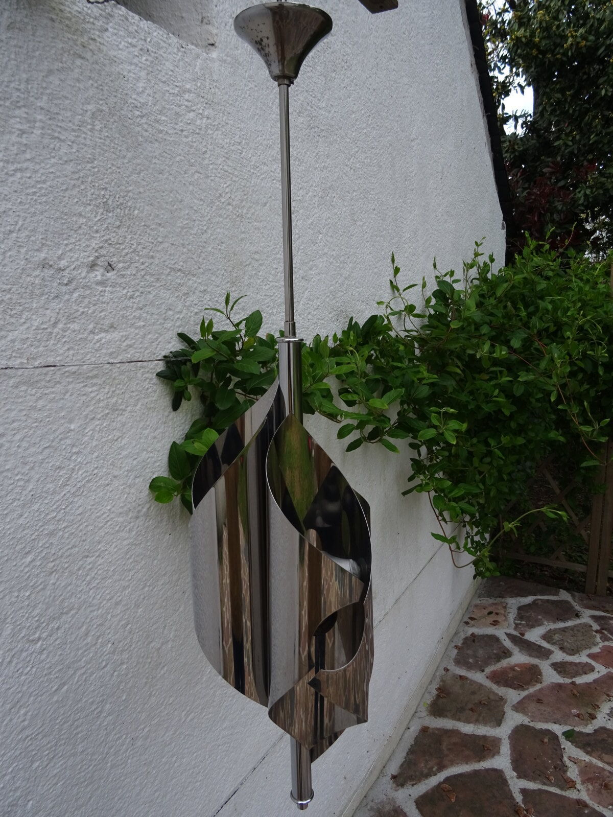 Hanging space age stainless steel