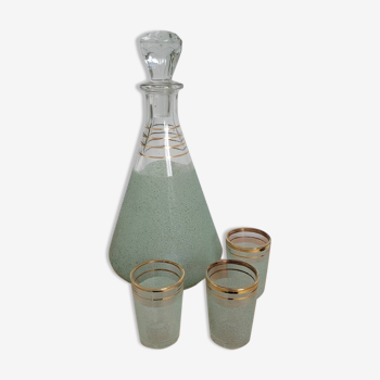 Bottle and small green and gold granita aperitif glasses
