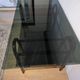 Bureau en rotin double plateau en verre fumé, années 70.