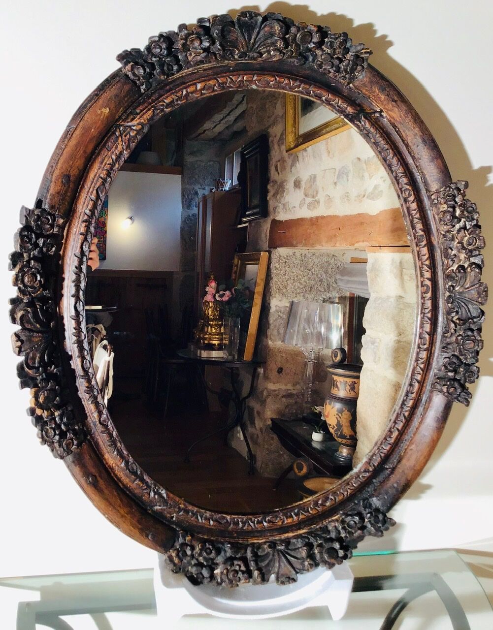 Oval mirror on an 18th century frame