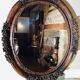 Oval mirror on an 18th century frame