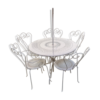 Old white wrought iron garden furniture