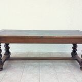 Louis XIII walnut table from the 19th century.