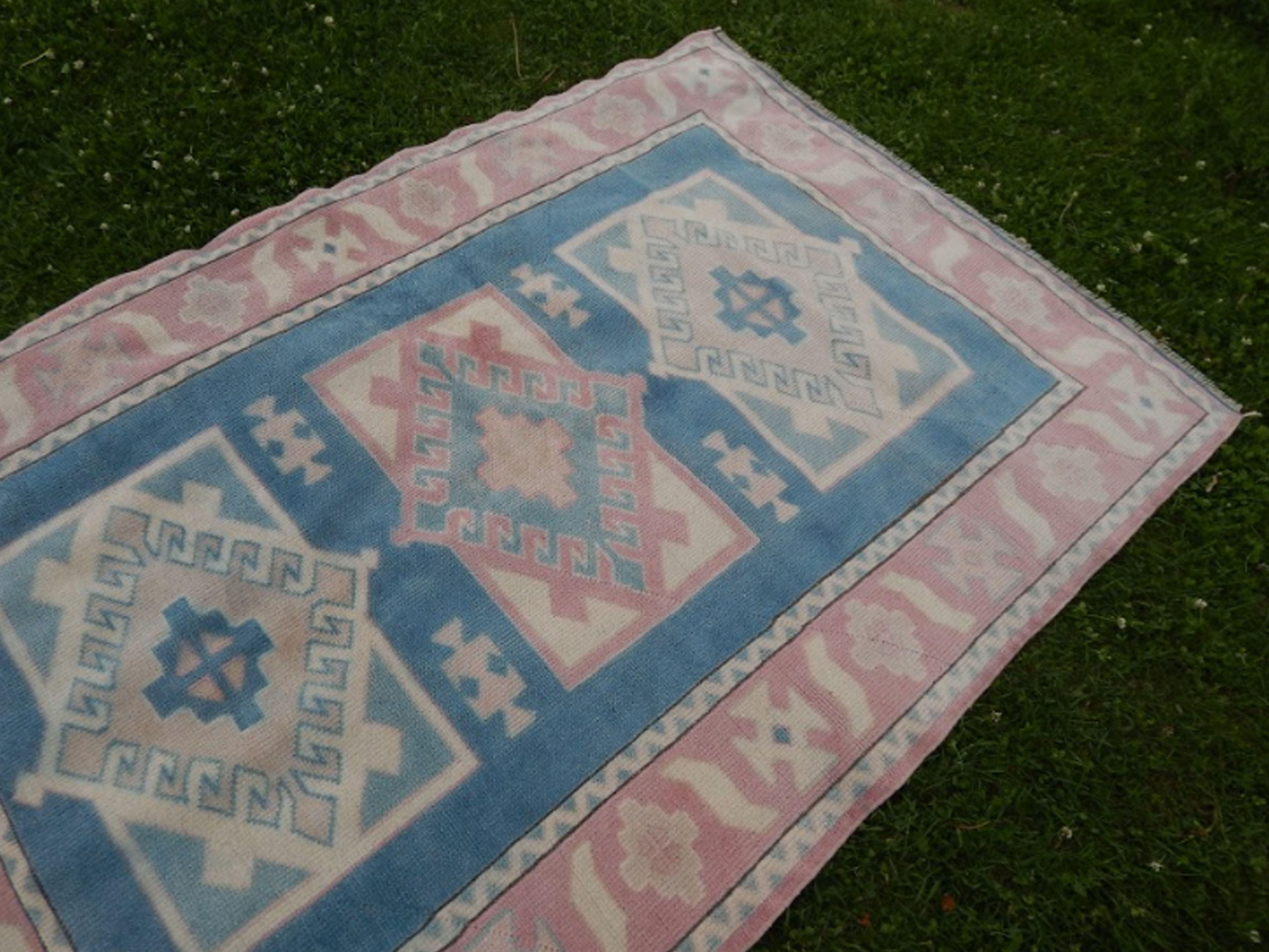 Turkish kars rug with rich border - 4′2″ × 6′2″ (128 x 188 cm)
