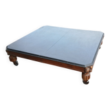 Coffee table with industrial wheels