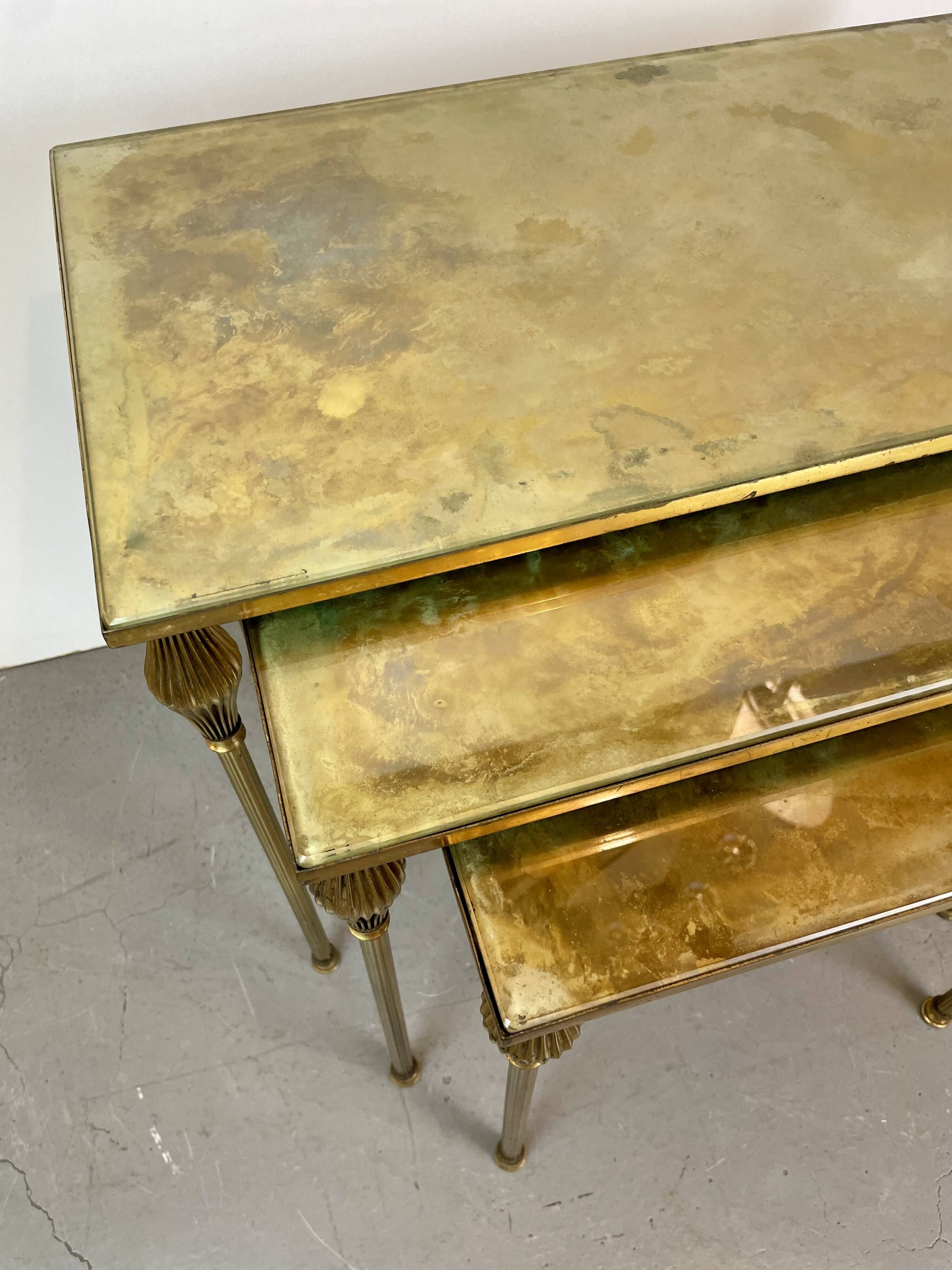 Nested brass tables, attributed to Maison Baguès, France, 1950–60.
