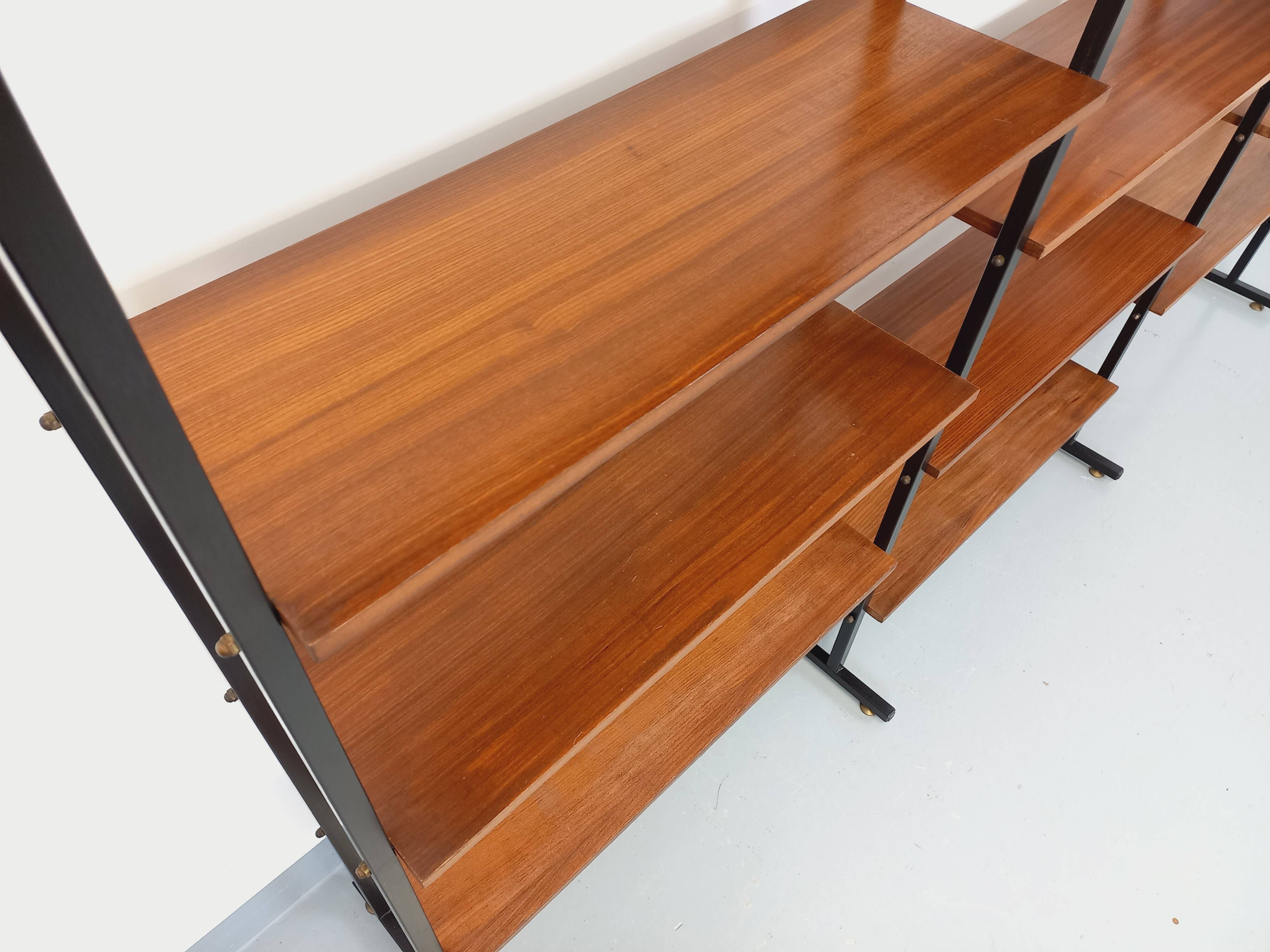 Vintage Italian triple modular bookshelf in teak and metal.