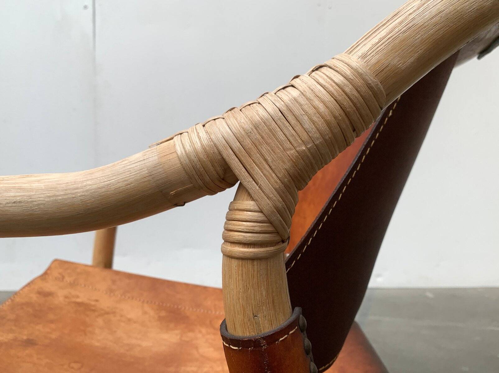 Mid-century safari lounge chair in bamboo and Danish leather, 1960s.