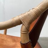 Mid-century safari lounge chair in bamboo and Danish leather, 1960s.