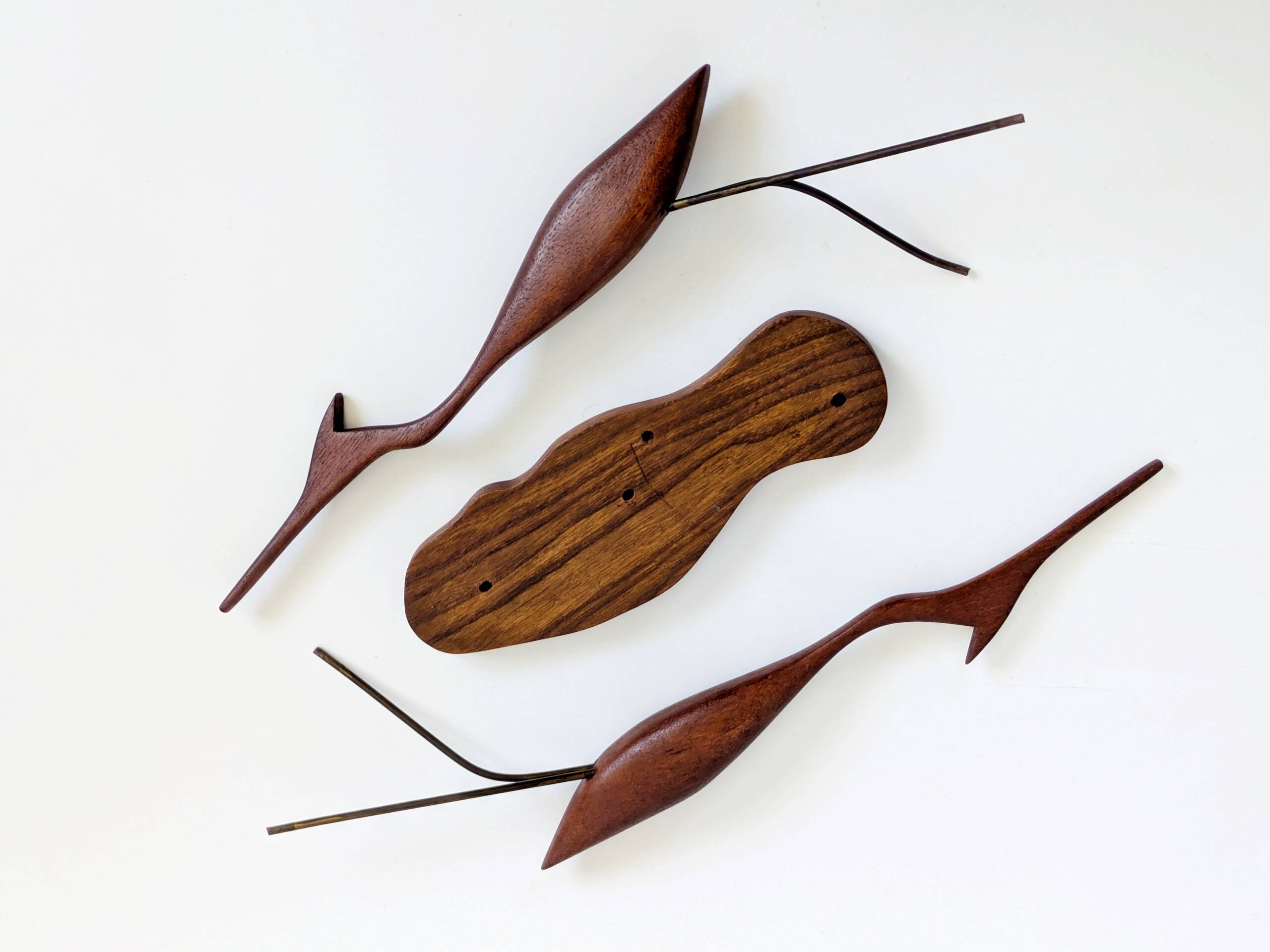 Scandinavian modernist sculpture cranes in teak.