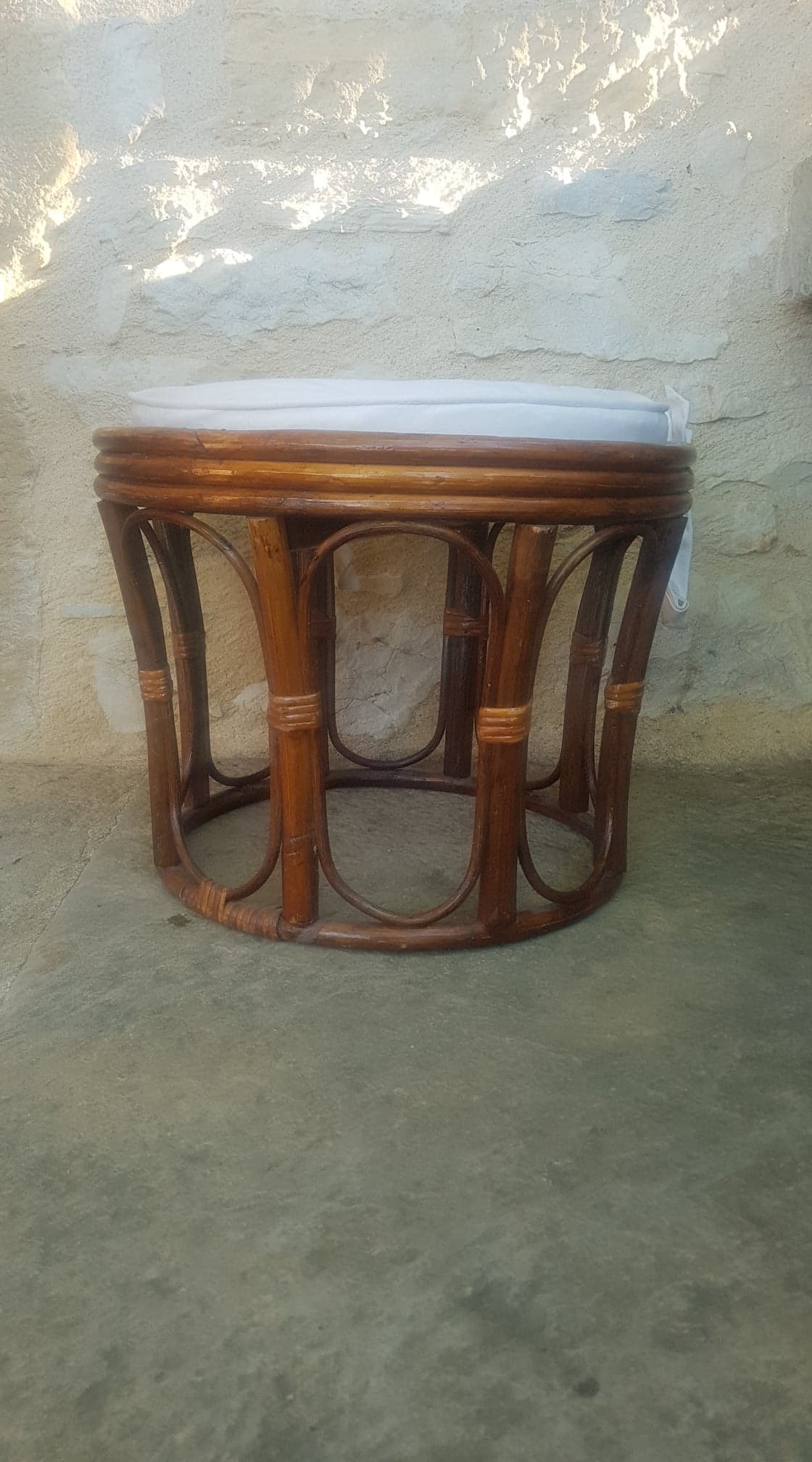 Rattan pouf with cushion