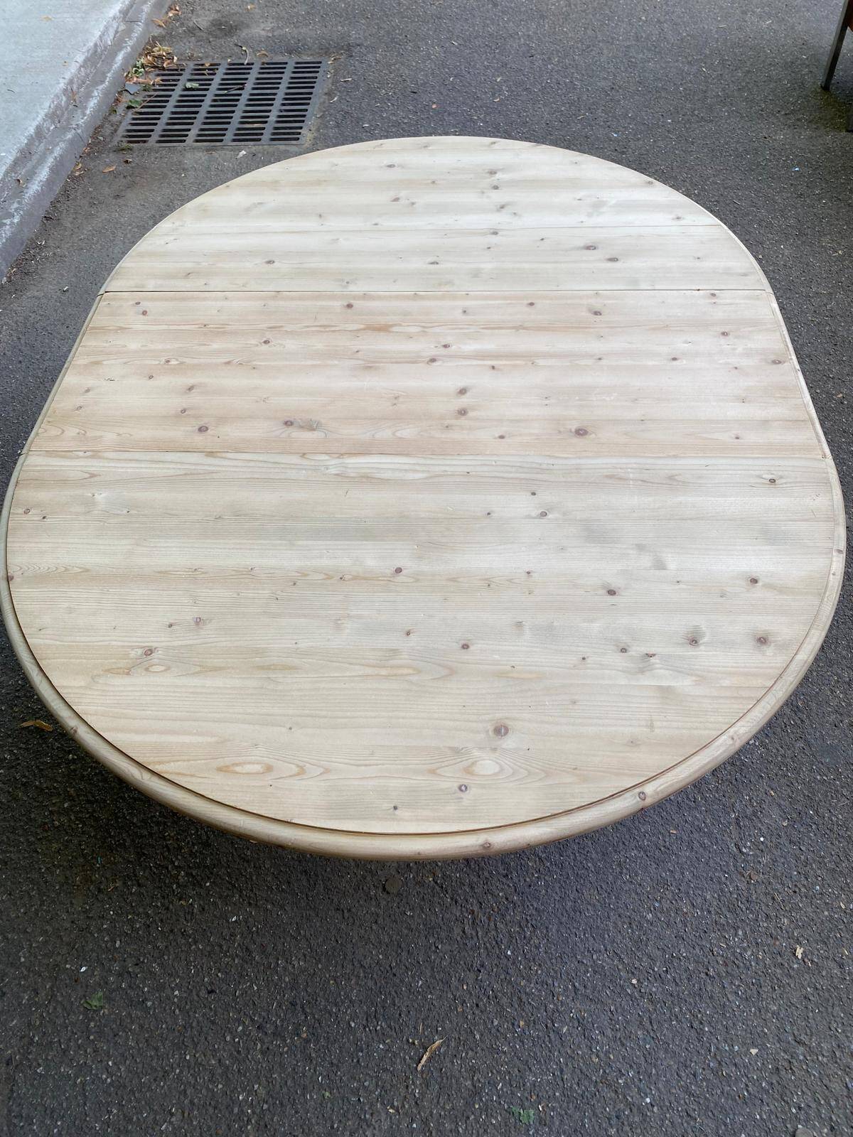 Interior's extendable round tripod dining table renovated in solid wood