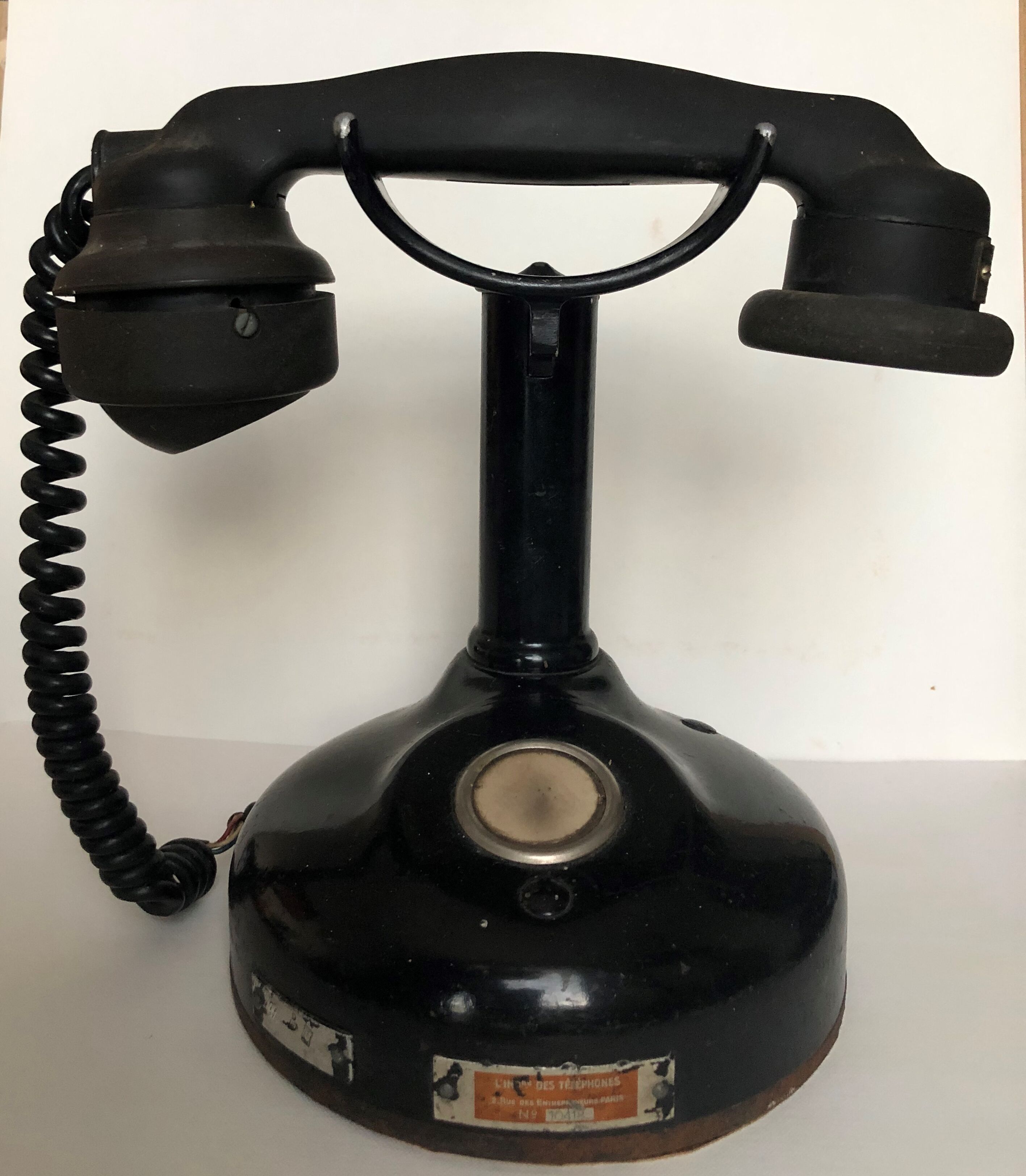 Old phone on column