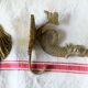 Pair of solid brass double patères