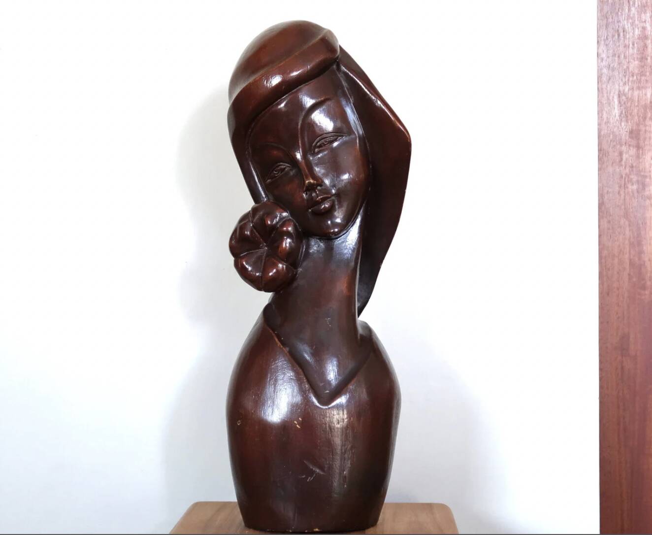 Wooden sculpture of a woman with a flower, 1970s