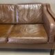 Scandinavian design 2-seater leather sofa.