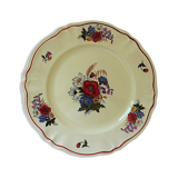 Circular dish with floral decoration and twisted edges