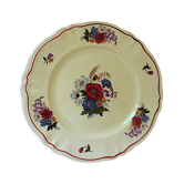 Circular dish with floral decoration and twisted edges