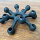 Brutalist Danish candle holder from the mid-century in cast iron by Jens H. Quistgaard.