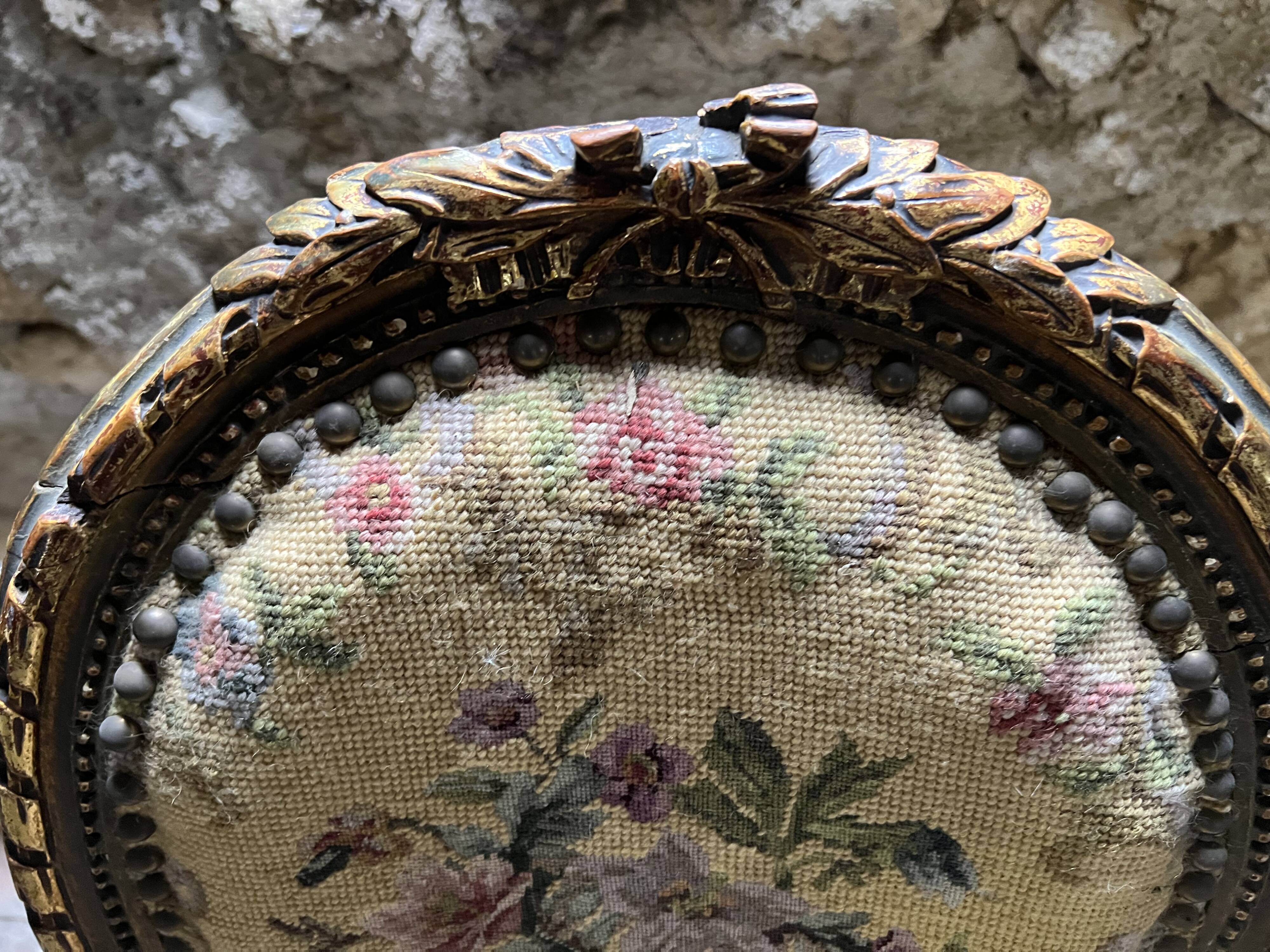pretty pair of Louis XVI style chairs, in carved and gilded wood