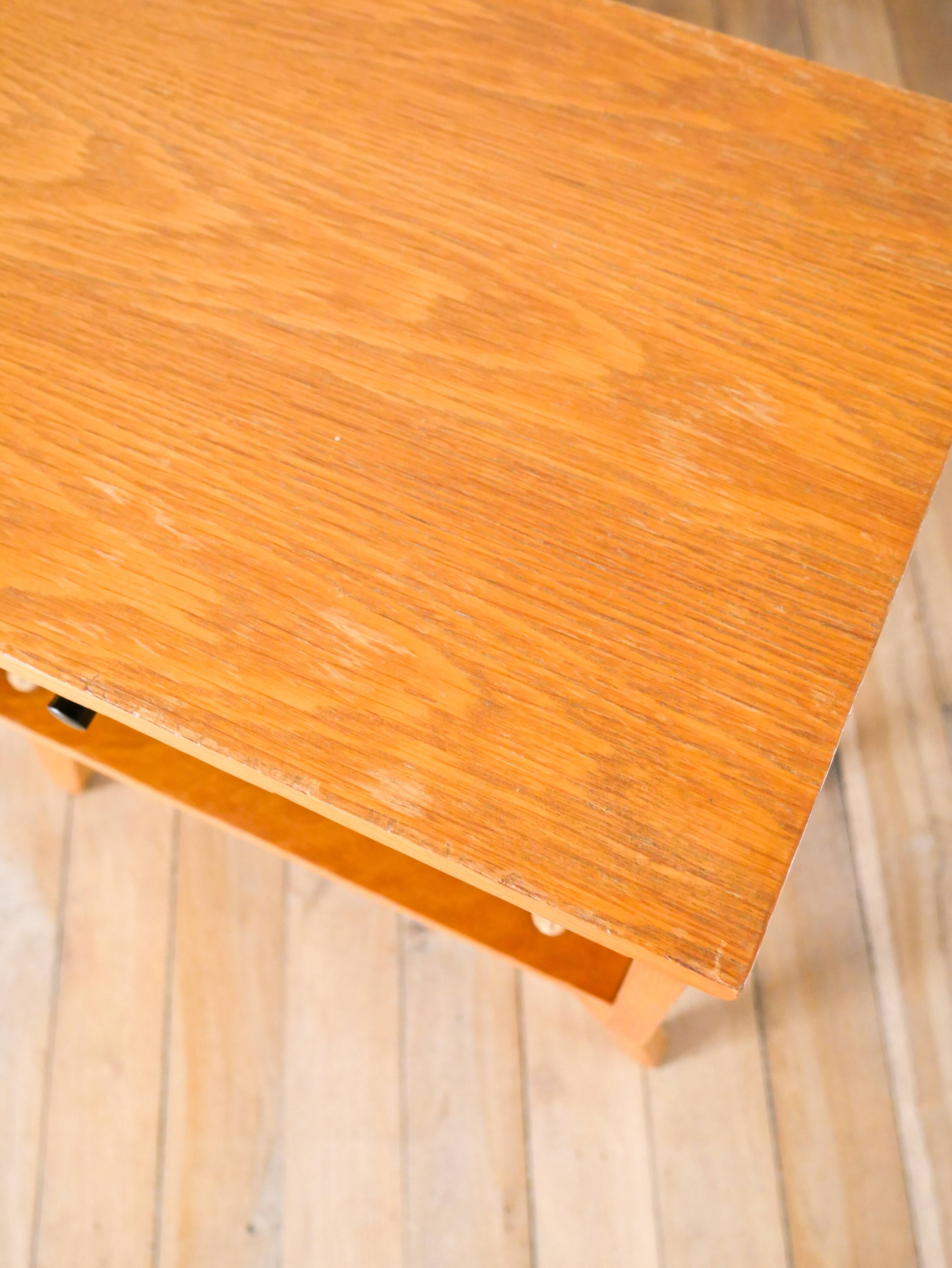 Scandinavian bedside table in teak veneer, with tapered legs and a drawer, 1960.