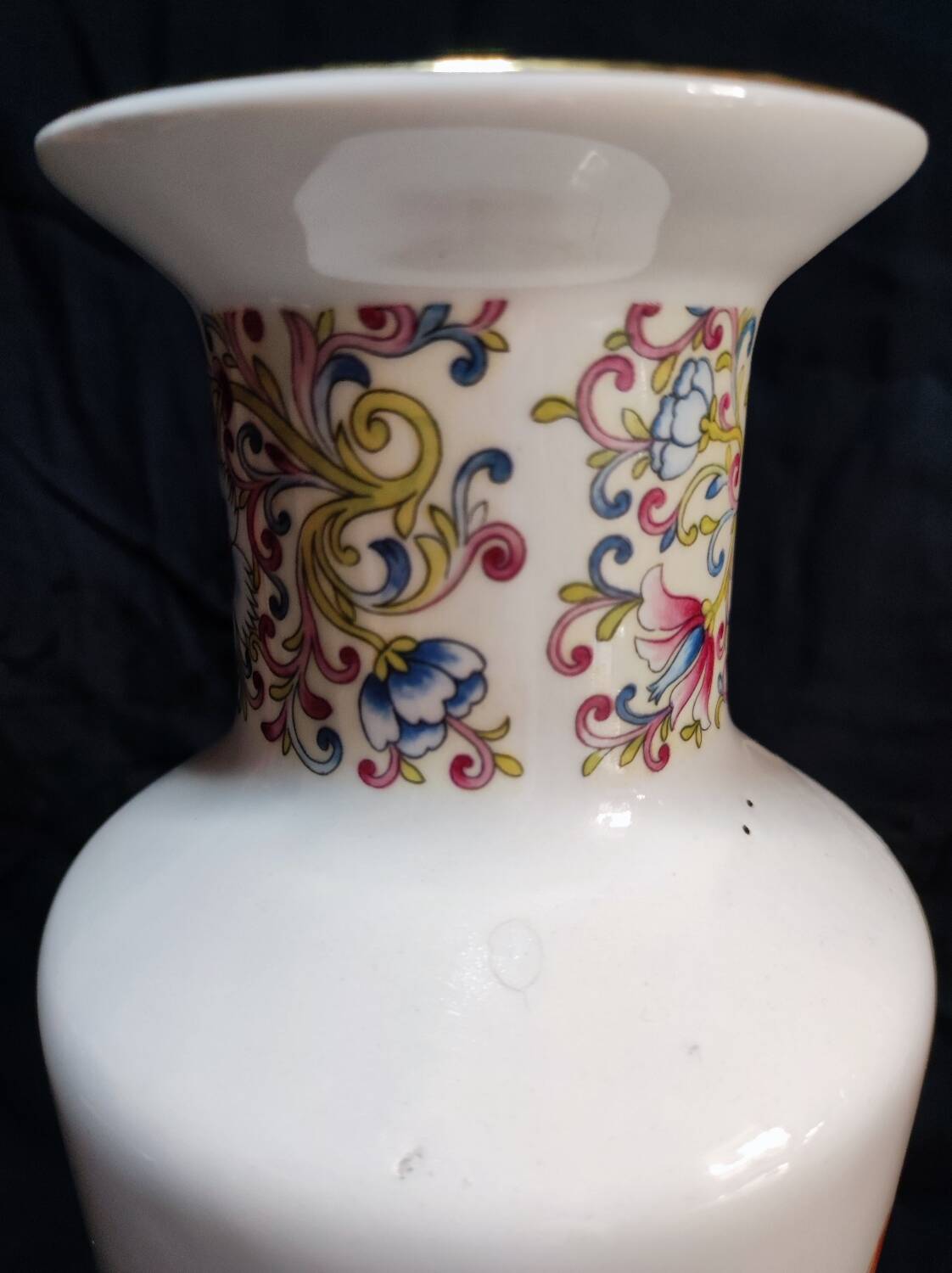 Porcelain peacock vase