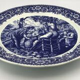 Blue enamelled earthenware wall dish with peasant scene decor Boch La Louvière