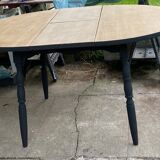 Table en bois ronde avec rallonge intégrée