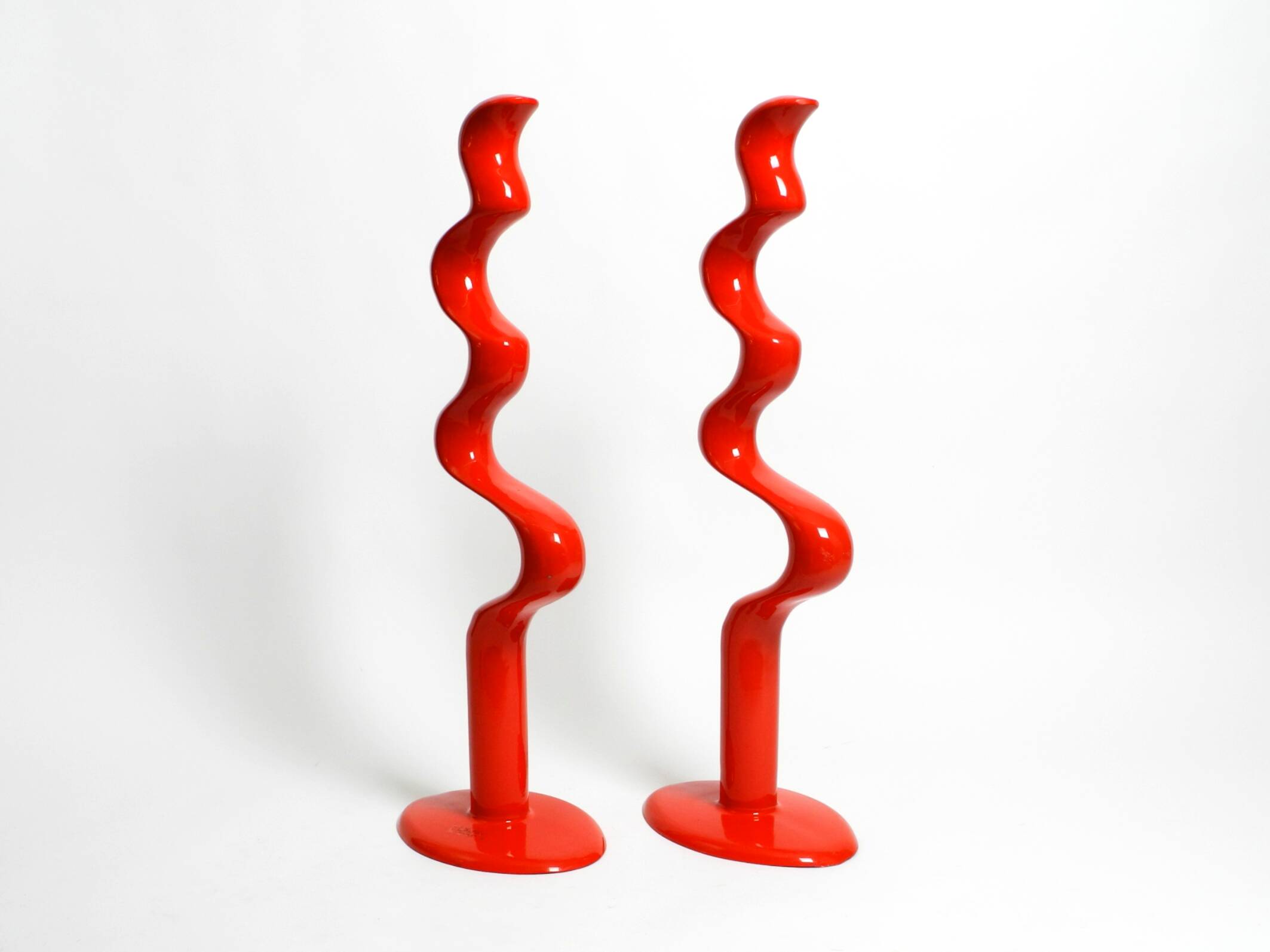 Two large limited abstract metal floor sculptures in red