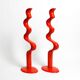 Two large limited abstract metal floor sculptures in red