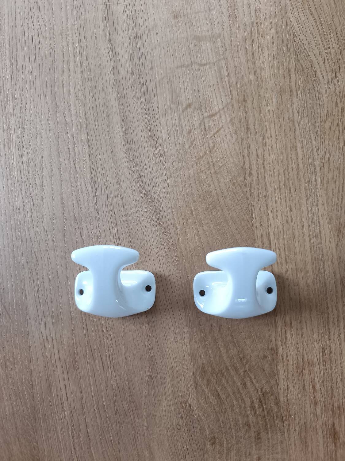 Pair of vintage porcelain coat hooks