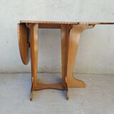 Oval table with formica flap