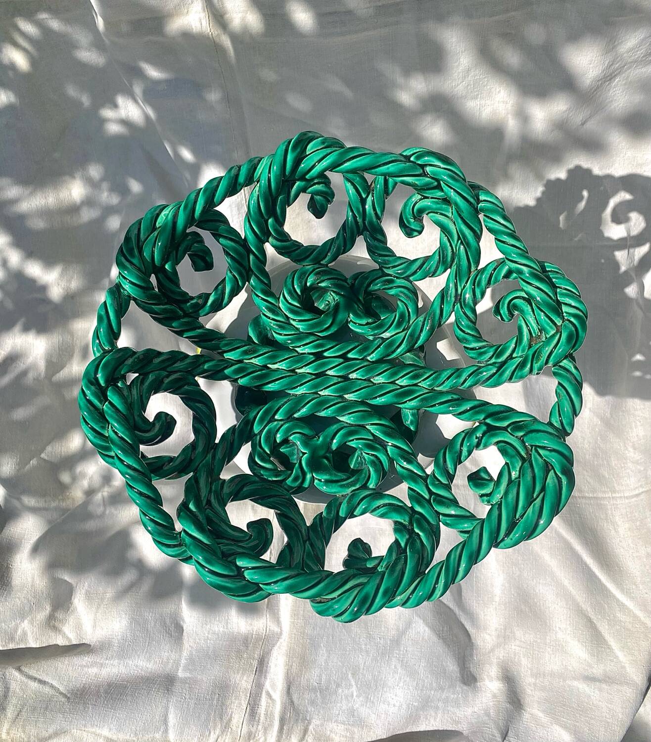 Large twisted green enamelled bowl