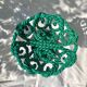 Large twisted green enamelled bowl