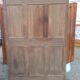 Louis XV Nantaise wardrobe carved with grape clusters, gendarme hat in fine cherry wood, late 19th century.