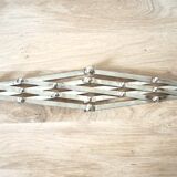 Expandable silver plated trivet