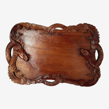 Ancient wooden tray carved with Chinese dragons around 1900