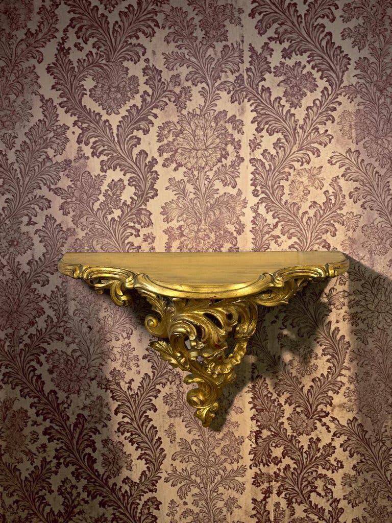 Baroque vintage gold wall-mounted console/table.