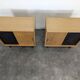 Pair of modernist sideboards with black glass doors in oak veneer.