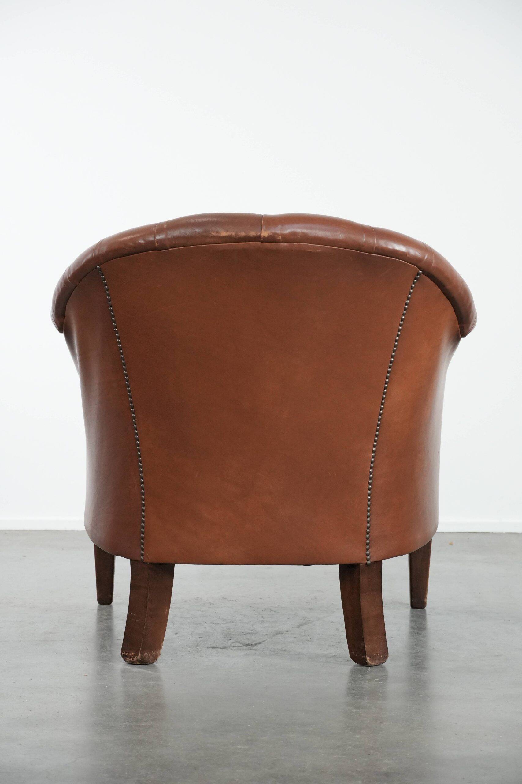 Chesterfield club armchair made of cowhide leather in English style