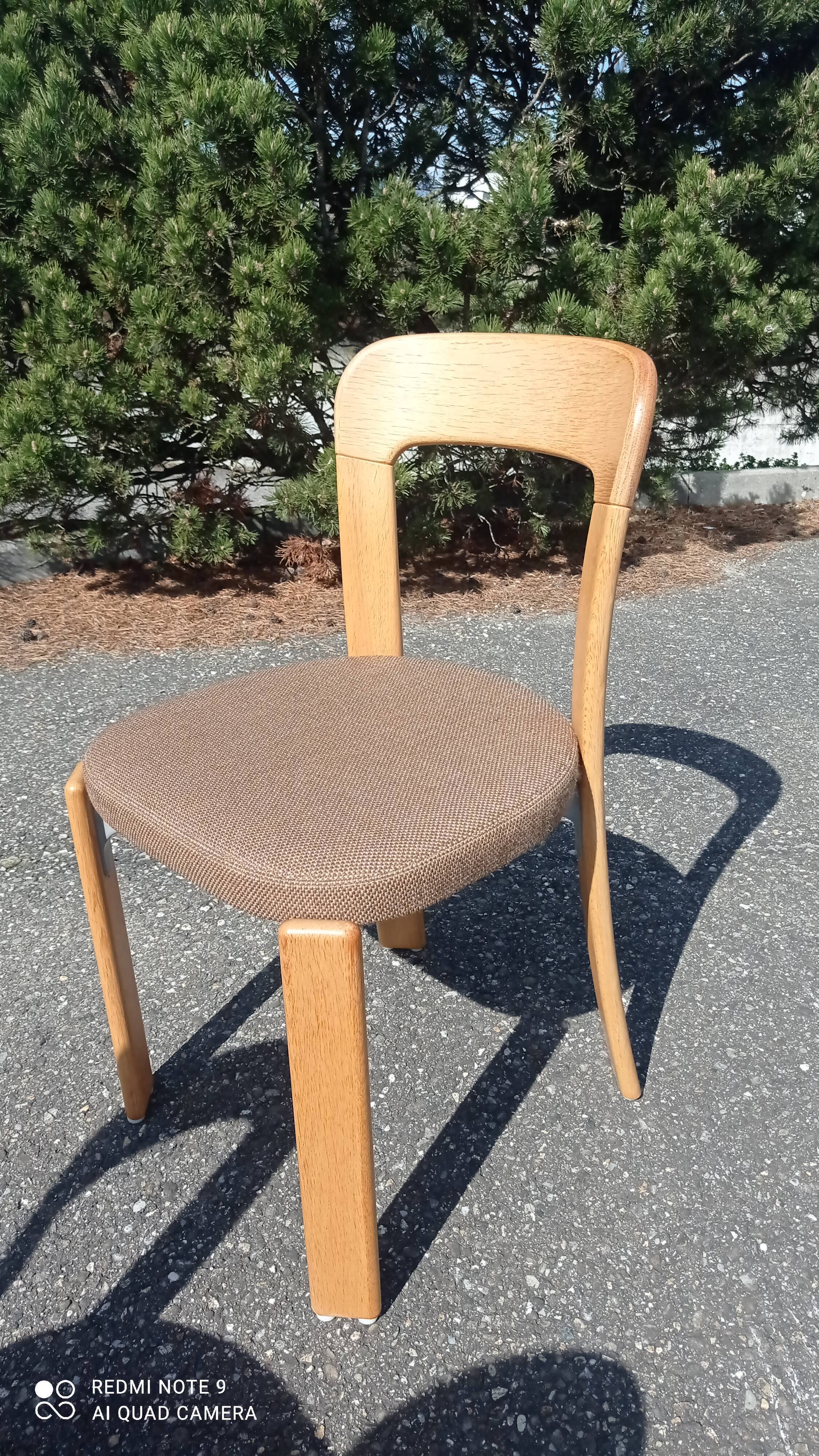 Pair of chairs by Bruno Rey in wood and fabric