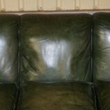 Victorian leather canapé, shield armrests, stamped Maple & Co.