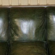 Victorian leather canapé, shield armrests, stamped Maple & Co.