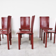6 red leather dining chairs made in Italy, 1980s