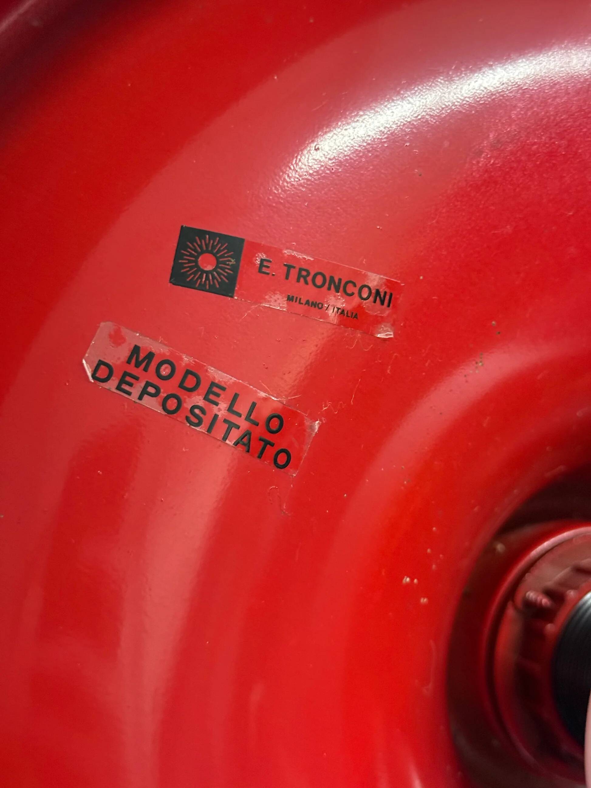 Red space age disc lamp by Enrico Tronconi