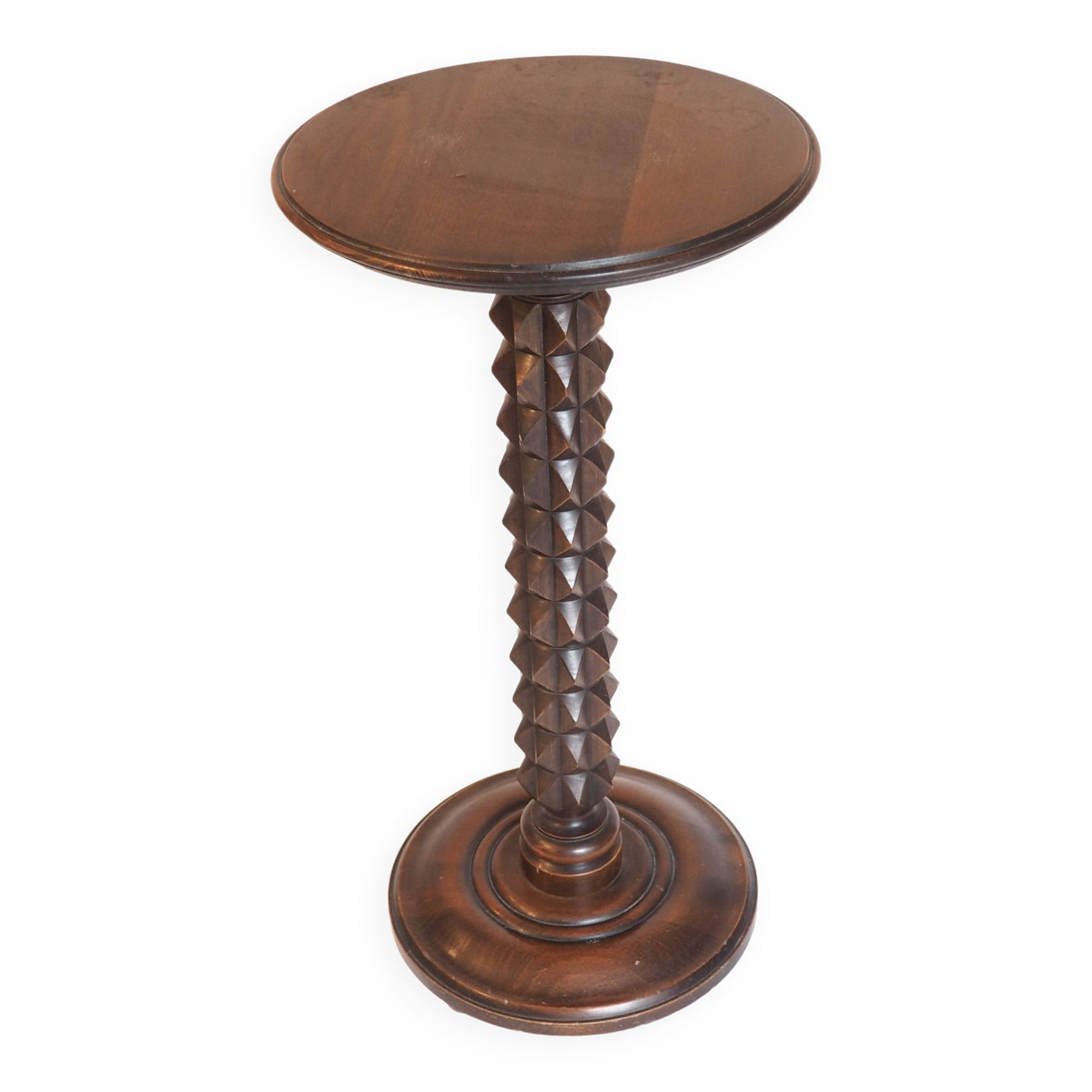 Wooden pedestal table with spiked columns